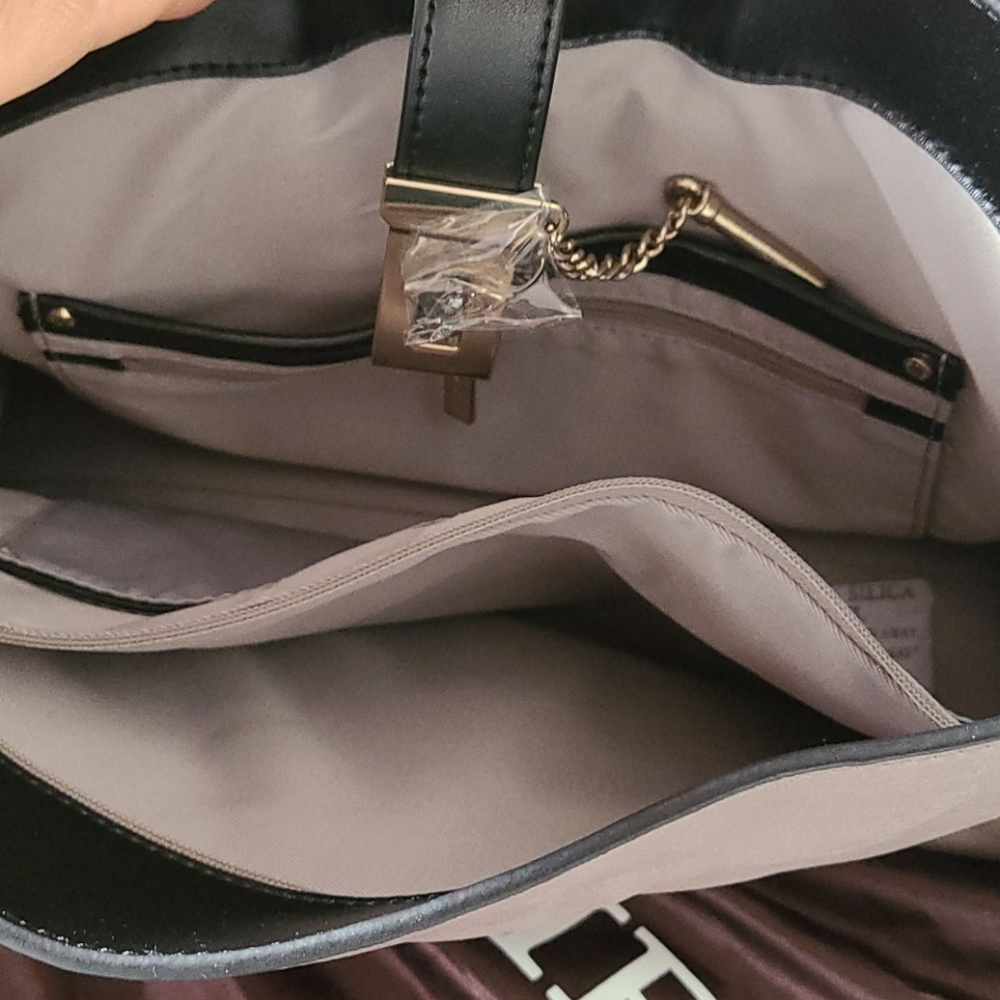 Danier taupe and black shoulder bag